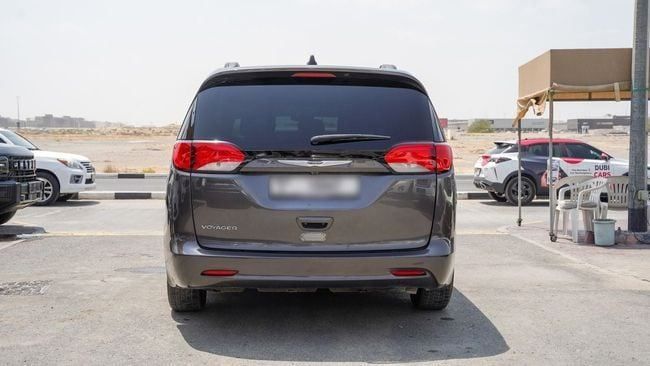 Used Chrysler Voyager VI, 3.6 l, 2023 in Sharjah by Alnujoom Al Malakiah Used Cars, Grey color. Canadian Specs | AUTO.AE