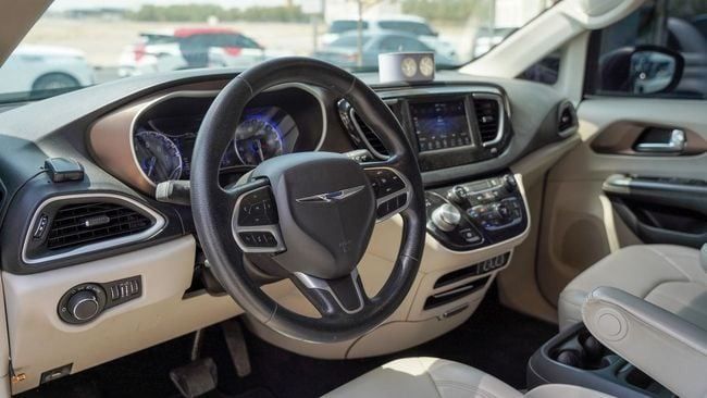 Used Chrysler Voyager VI, 3.6 l, 2023 in Sharjah by Alnujoom Al Malakiah Used Cars, Grey color. Canadian Specs | AUTO.AE