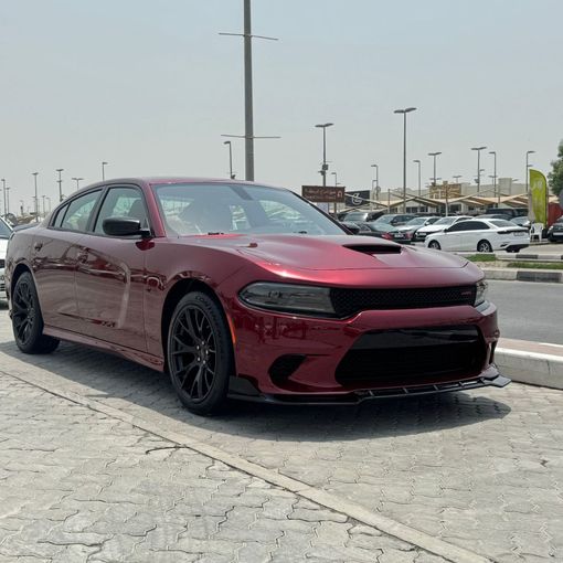 Подержанный Dodge Charger VI (LD) Рестайлинг, 3.6 л, 2023 в Шардже от Alfaris Used Cars Красный цвет.  | AUTO.AE