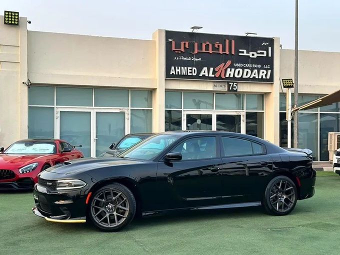 Подержанный Dodge Charger R_T VI (LD) Рестайлинг, 5.7 л, 2018 в Шардже от Ahmad alkhodari Motors Черный цвет. GCC | AUTO.AE