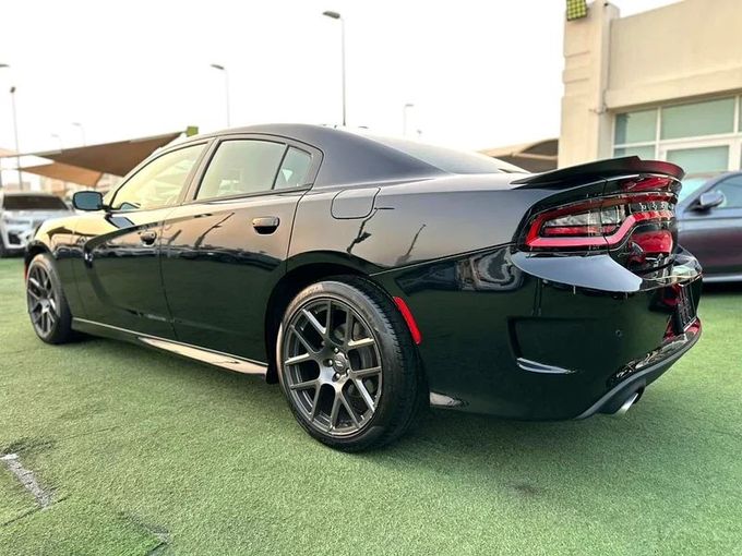 Подержанный Dodge Charger R_T VI (LD) Рестайлинг, 5.7 л, 2018 в Шардже от Ahmad alkhodari Motors Черный цвет. GCC | AUTO.AE