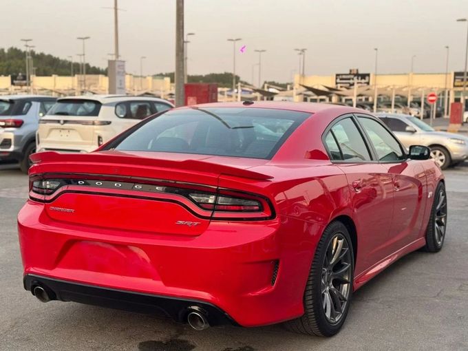 Подержанный Dodge Charger SRT VII (LD) Рестайлинг, 6.4 л, 2016 в Шардже от Nour Alnukhba Motors Красный цвет. GCC | AUTO.AE