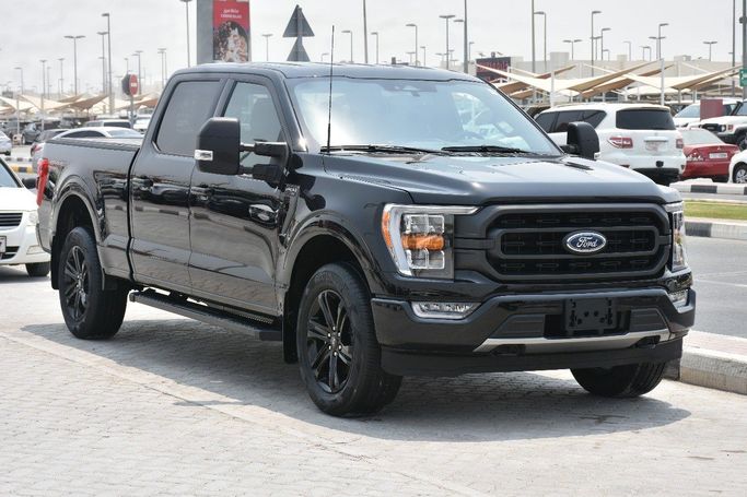 Подержанный Ford F-150 XIV, 3.5 л, 2023 в Шардже от Alfaris Used Cars Черный цвет.  | AUTO.AE
