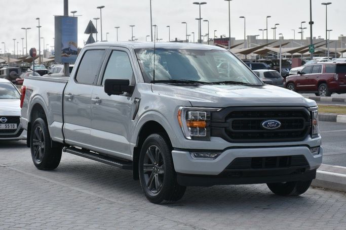 Подержанный Ford F-150 XIV, 3.5 л, 2023 в Шардже от Alfaris Used Cars Серый цвет.  | AUTO.AE