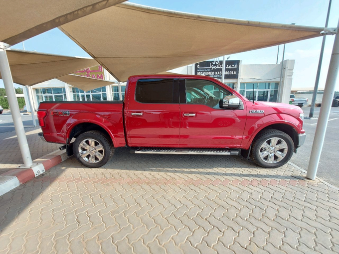 Подержанный Ford F-150 XIII Рестайлинг, 3.5 л, 2019 в Шардже от MK Cars Красный цвет. Американская | AUTO.AE
