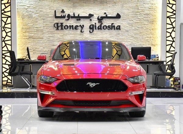 Used Ford Mustang VI Facelift, 5.0 l, 2020 in Sharjah by Honey Gidosha Used Cars Tr., Red color.  | AUTO.AE