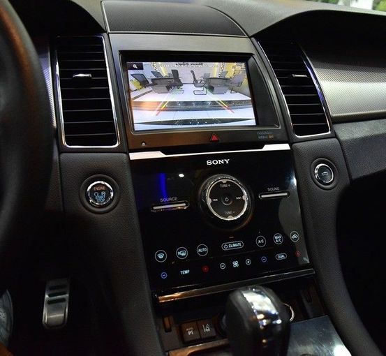 Подержанный Ford Taurus VI Рестайлинг, 3.5 л, 2014 в Шардже от Honey Gidosha Used Cars Tr. Черный цвет.  | AUTO.AE