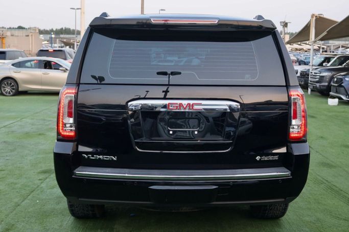 Подержанный GMC Yukon IV (GMT K2UG), 6.2 л, 2019 в Шардже от Al Bake Used Cars Черный цвет. GCC | AUTO.AE