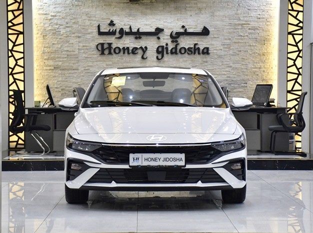 Новый Hyundai Elantra VII (CN7) Рестайлинг, 1.6 л, 2025 в Шардже от Honey Gidosha Used Cars Tr. Белый цвет.  | AUTO.AE