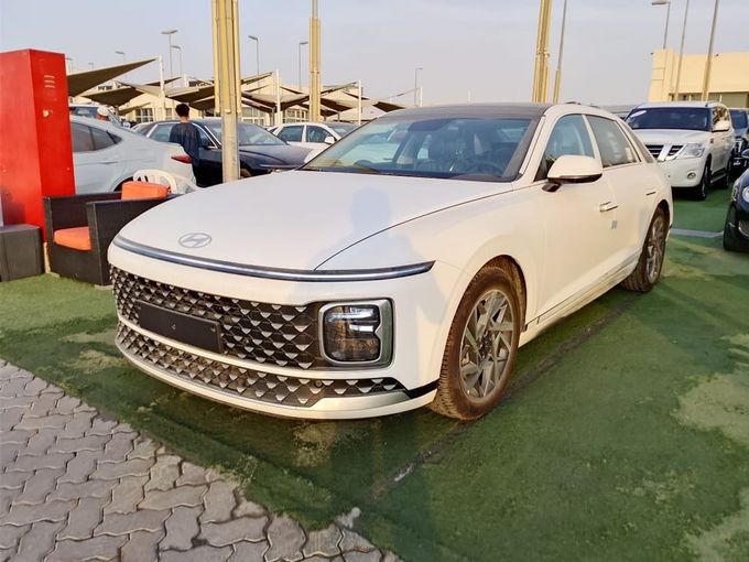 New Hyundai Grandeur VII, 1.6 l, 2024 in Sharjah by Rebou Najd Used Cars, White color. GCC Specs | AUTO.AE