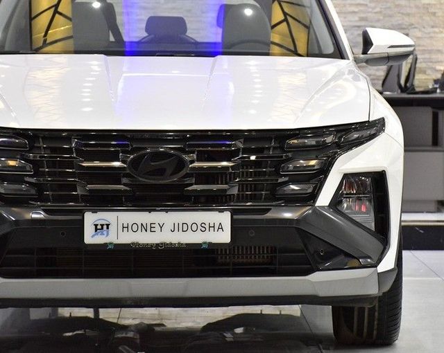 Новый Hyundai Tucson IV Рестайлинг, 1.5 л, 2025 в Шардже от Honey Gidosha Used Cars Tr. Белый цвет.  | AUTO.AE