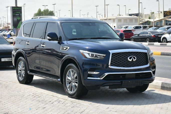 Подержанный Infiniti QX80 I Рестайлинг 3, 5.6 л, 2022 в Шардже от Alfaris Used Cars Синий цвет.  | AUTO.AE