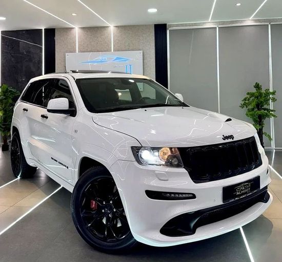 Used Jeep Grand Cherokee SRT IV (WK2) Facelift, 6.4 l, 2014 in Sharjah by Ayoon Alhoot Motors, White color. GCC Specs | AUTO.AE