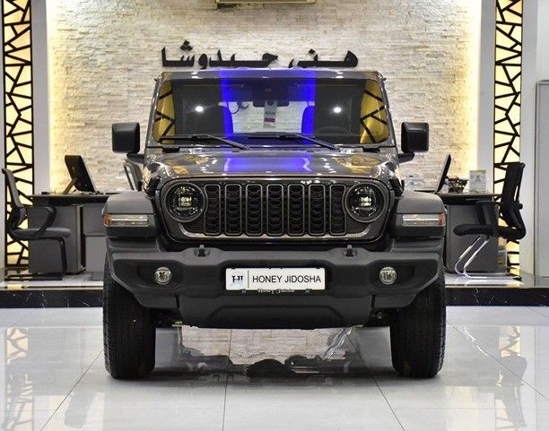 Новый Jeep Wrangler IV (JL) Рестайлинг, 2.0 л, 2025 в Шардже от Honey Gidosha Used Cars Tr. Серый цвет.  | AUTO.AE