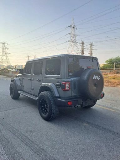 Новый Jeep Wrangler IV (JL) Рестайлинг, 3.6 л, 2023 в Шардже от Imad Younis Almani used Cars Серый цвет. GCC | AUTO.AE