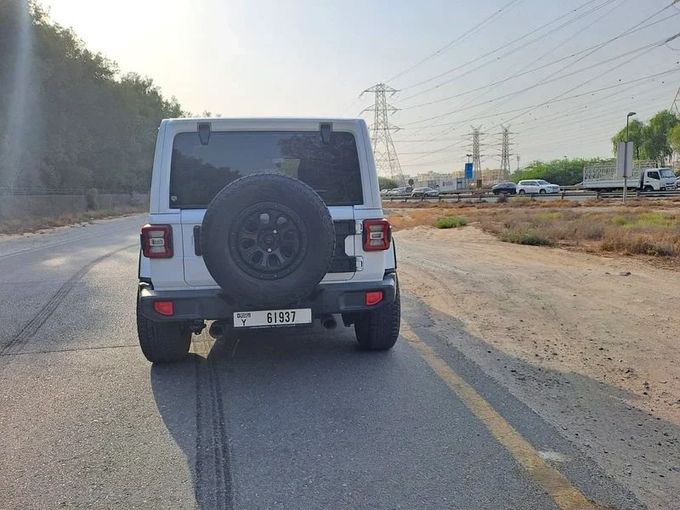 New Jeep Wrangler IV (JL), 6.4 l, 2020 in Sharjah by Imad Younis Almani used Cars, White color. GCC Specs | AUTO.AE