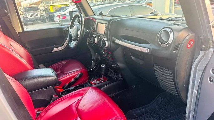 New Jeep Wrangler III (JK), 3.6 l, 2016 in Sharjah by Imad Younis Almani used Cars, Silver color. GCC Specs | AUTO.AE