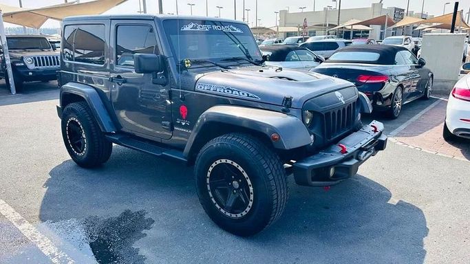 New Jeep Wrangler III (JK), 3.6 l, 2016 in Sharjah by Imad Younis Almani used Cars, Black color. GCC Specs | AUTO.AE
