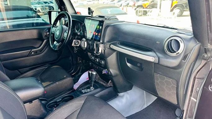 New Jeep Wrangler III (JK), 3.6 l, 2016 in Sharjah by Imad Younis Almani used Cars, Black color. GCC Specs | AUTO.AE