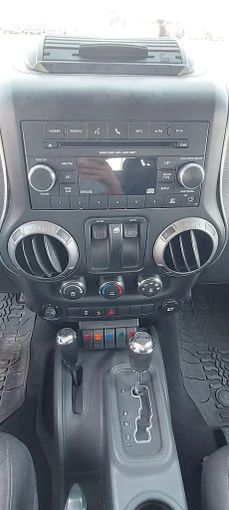 New Jeep Wrangler III (JK), 3.6 l, 2014 in Sharjah by Sama alsaadah Cars, Grey color. American Specs | AUTO.AE