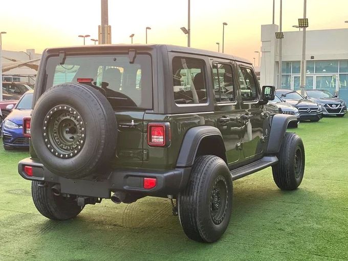 Used Jeep Wrangler IV (JL), 2.0 l, 2021 in Sharjah by Ahmad alkhodari Motors, Green color. GCC Specs | AUTO.AE