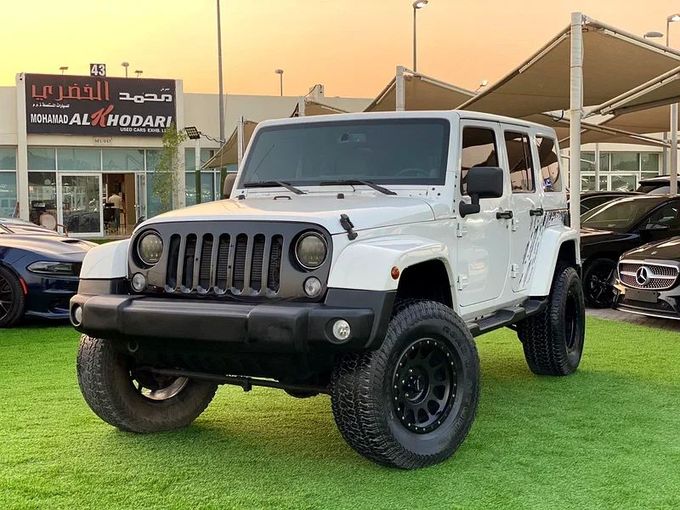 Used Jeep Wrangler III (JK), 3.6 l, 2014 in Sharjah by Ahmad alkhodari Motors, White color. GCC Specs | AUTO.AE