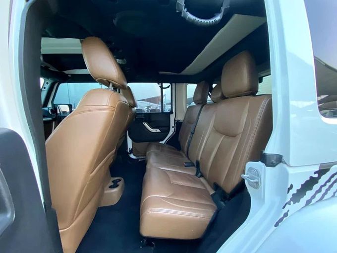 Used Jeep Wrangler III (JK), 3.6 l, 2014 in Sharjah by Ahmad alkhodari Motors, White color. GCC Specs | AUTO.AE