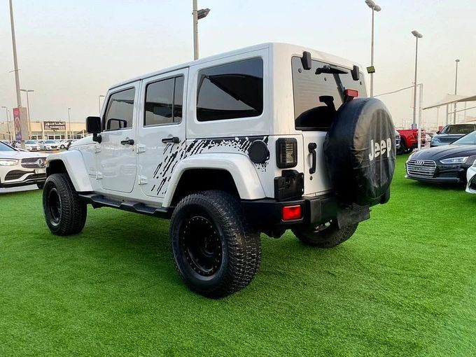 Used Jeep Wrangler III (JK), 3.6 l, 2014 in Sharjah by Ahmad alkhodari Motors, White color. GCC Specs | AUTO.AE