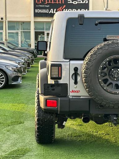 Used Jeep Wrangler III (JK), 3.6 l, 2015 in Sharjah by Ahmad alkhodari Motors, Silver color. GCC Specs | AUTO.AE