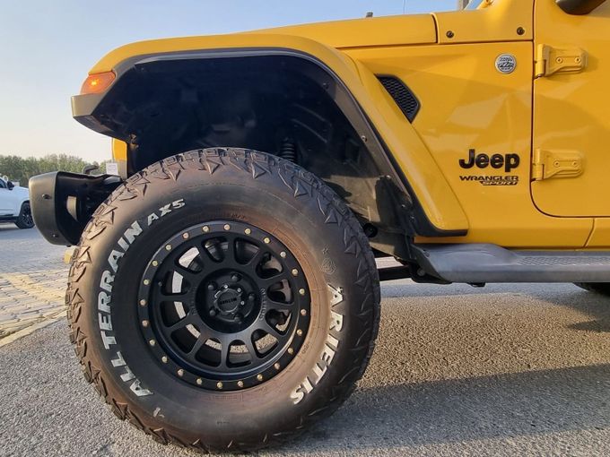 Used Jeep Wrangler IV (JL), 2.0 l, 2018 in Sharjah, Yellow color. GCC Specs | AUTO.AE