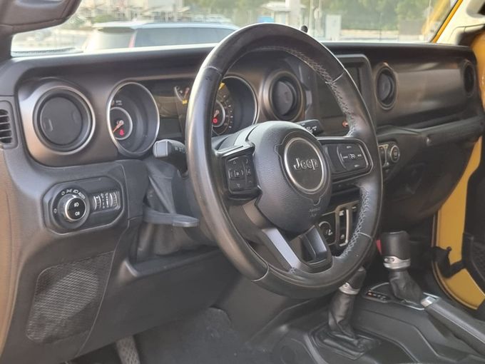 Used Jeep Wrangler IV (JL), 2.0 l, 2018 in Sharjah, Yellow color. GCC Specs | AUTO.AE