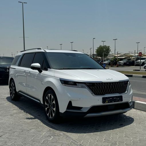 Подержанный Kia Carnival IV, 3.5 л, 2021 в Шардже от Alfaris Used Cars Белый цвет.  | AUTO.AE