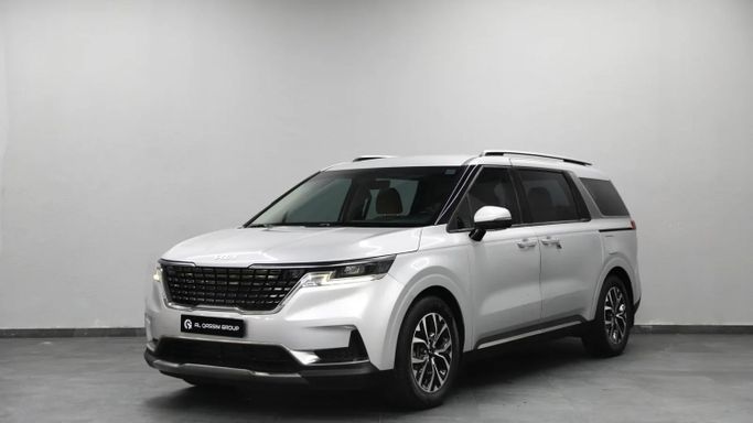Подержанный Kia Carnival IV, 3.5 л, 2022 в Шардже от Al Qassem Cars Trading Белый цвет. GCC | AUTO.AE