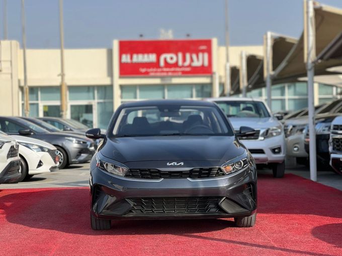 New Kia Cerato IV Facelift, 1.6 l, 2023 in Sharjah by Al Aram Cars, Grey color. GCC Specs | AUTO.AE