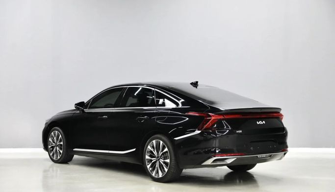 Подержанный Kia K8 I, 3.5 л, 2022 в Шардже от Al Qassem Cars Trading Черный цвет. Корейская | AUTO.AE