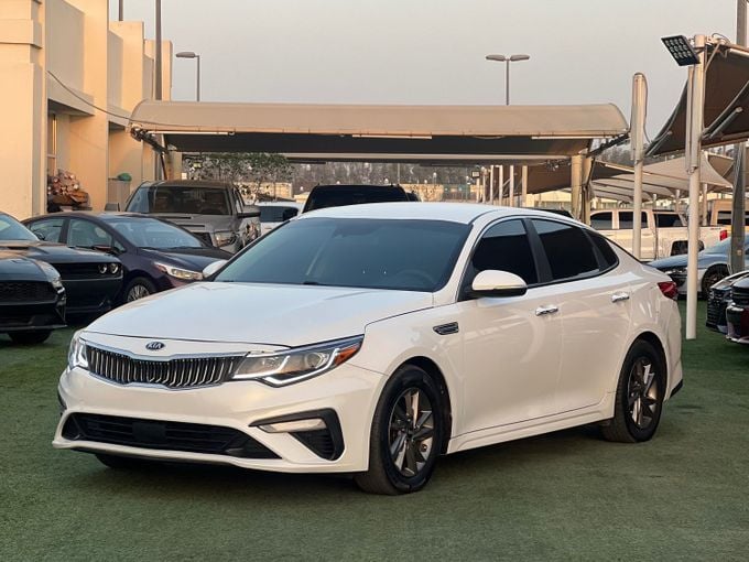 Новый Kia Optima IV Рестайлинг, 2.0 л, 2020 в Шардже от Lamer Motors Белый цвет. Американская | AUTO.AE