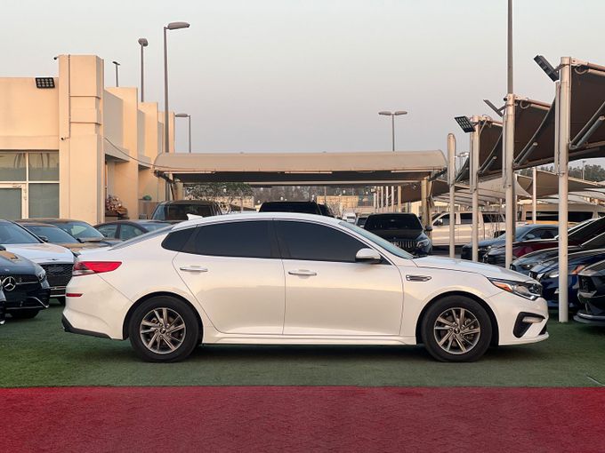Новый Kia Optima IV Рестайлинг, 2.0 л, 2020 в Шардже от Lamer Motors Белый цвет. Американская | AUTO.AE