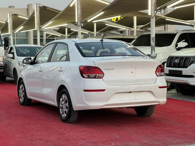 New Kia Pegas, 1.4 l, 2023 in Sharjah by Al Aram Cars, White color. GCC Specs | AUTO.AE