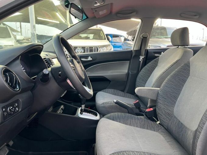 New Kia Pegas, 1.4 l, 2023 in Sharjah by Al Aram Cars, White color. GCC Specs | AUTO.AE