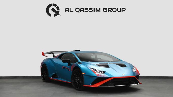 Подержанный Lamborghini Huracán I Рестайлинг, 5.2 л, 2022 в Шардже от Al Qassem Cars Trading Синий цвет. Американская | AUTO.AE
