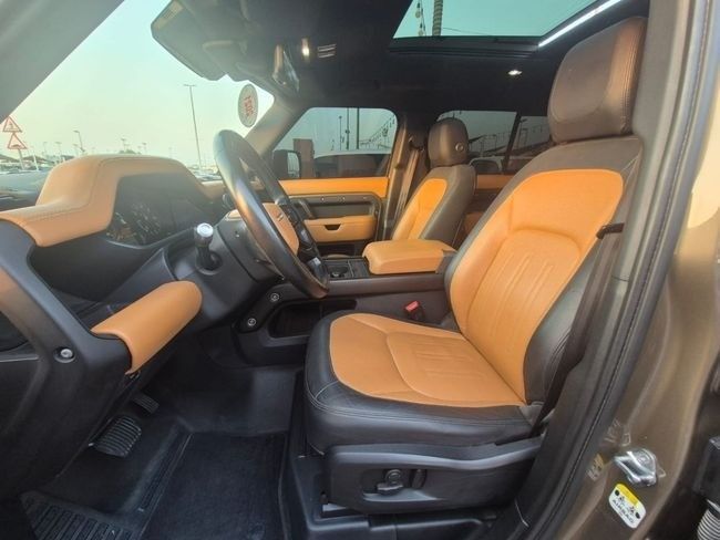 Used Land Rover Defender 110 II, 3.0 l, 2021 in Sharjah by Rebou Najd Used Cars, Brown color. American Specs | AUTO.AE