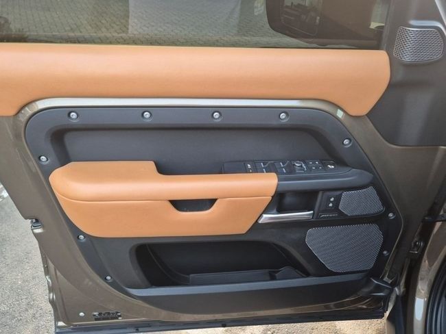 Used Land Rover Defender 110 II, 3.0 l, 2021 in Sharjah by Rebou Najd Used Cars, Brown color. American Specs | AUTO.AE
