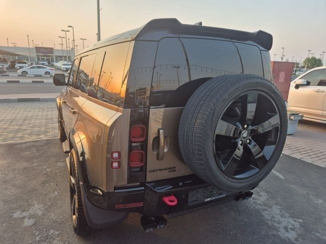 Used Land Rover Defender 110 II, 3.0 l, 2021 in Sharjah by Rebou Najd Used Cars, Brown color. American Specs | AUTO.AE