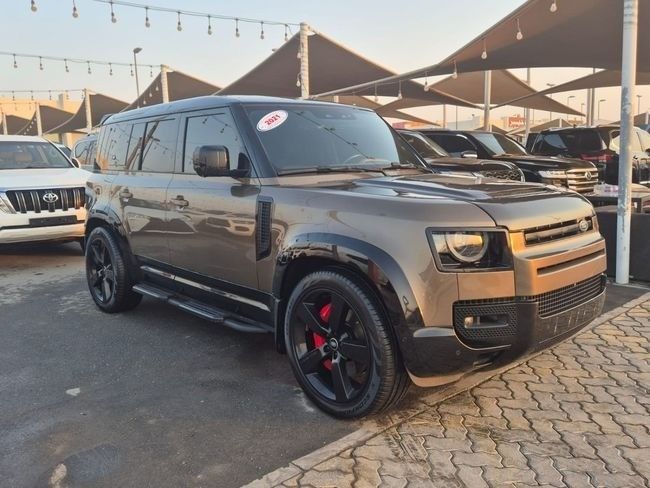 Used Land Rover Defender 110 II, 3.0 l, 2021 in Sharjah by Rebou Najd Used Cars, Brown color. American Specs | AUTO.AE