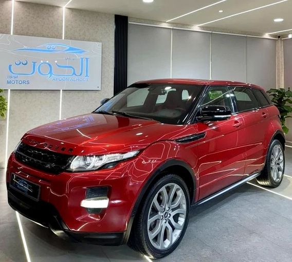Подержанный Land Rover Range Rover Evoque I, 2.0 л, 2014 в Шардже от Ayoon Alhoot Motors Красный цвет. GCC | AUTO.AE