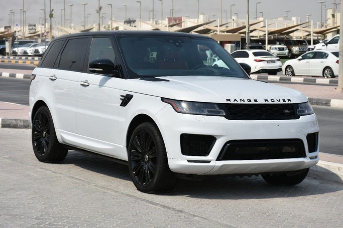 Подержанный Land Rover Range Rover Sport II Рестайлинг, 5.0 л, 2020 в Шардже от Alfaris Used Cars Белый цвет.  | AUTO.AE
