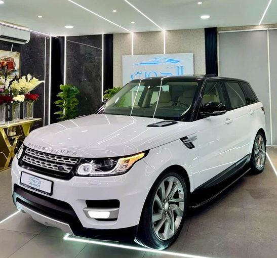 Подержанный Land Rover Range Rover Sport II, 5.0 л, 2015 в Шардже от Ayoon Alhoot Motors Белый цвет. GCC | AUTO.AE