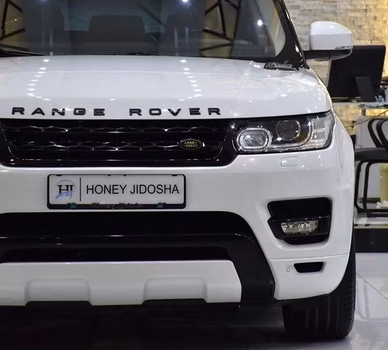 Used Land Rover Range Rover Sport II, 5.0 l, 2014 in Sharjah by Honey Gidosha Used Cars Tr., White color.  | AUTO.AE