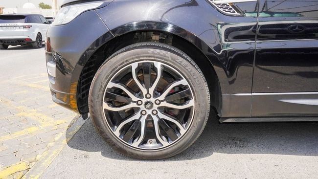 Used Land Rover Range Rover Sport II, 5.0 l, 2017 in Sharjah by Alnujoom Al Malakiah Used Cars, Black color. American Specs | AUTO.AE