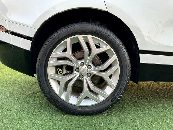 Used Land Rover Range Rover Velar P250 I, 2.0 l, 2020 in Sharjah by Ahmad alkhodari Motors, White color. GCC Specs | AUTO.AE